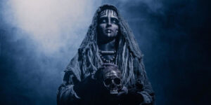 Pagan woman holding a skull